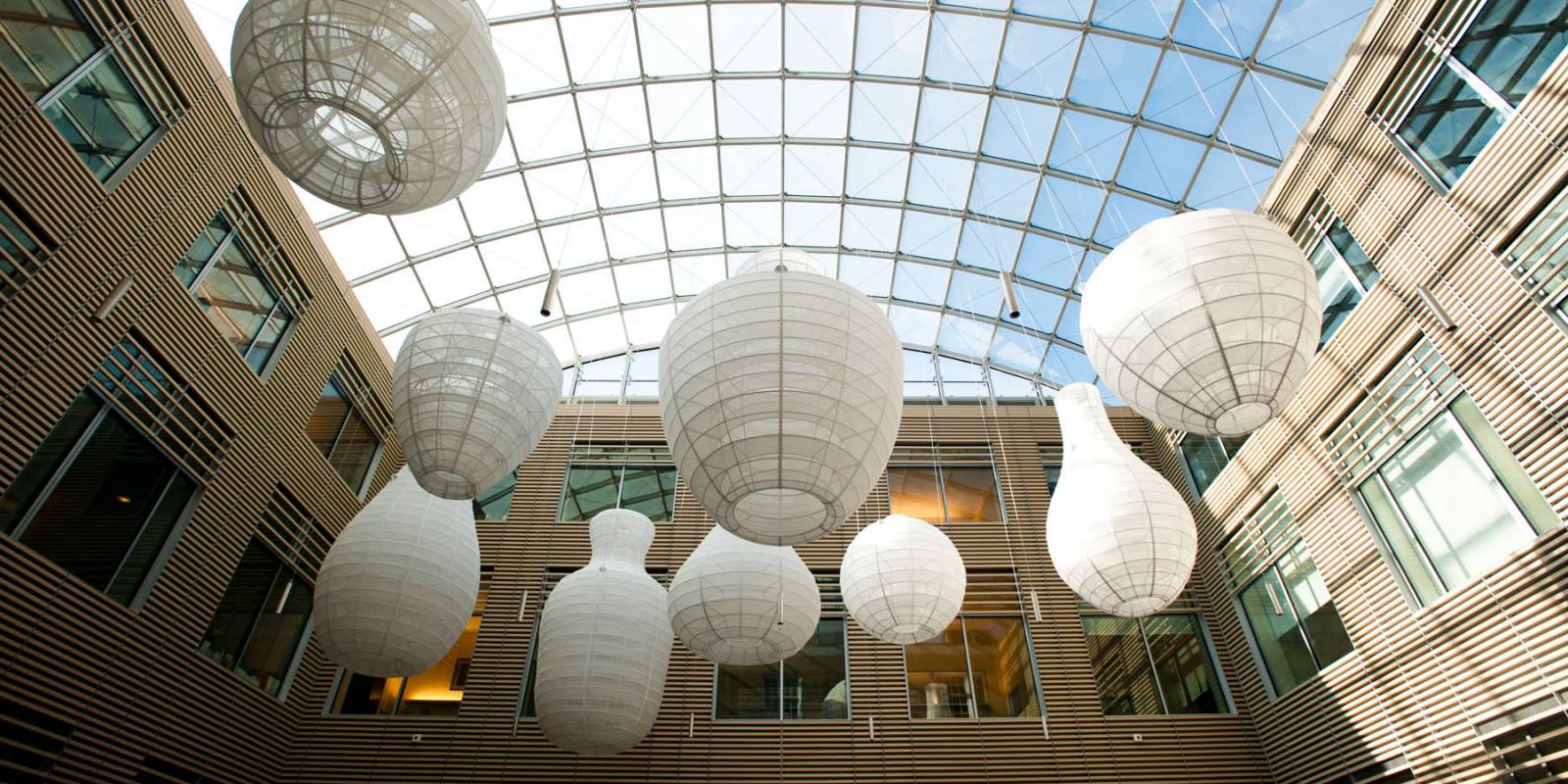 Lantern sculptures hanging from ceiling
