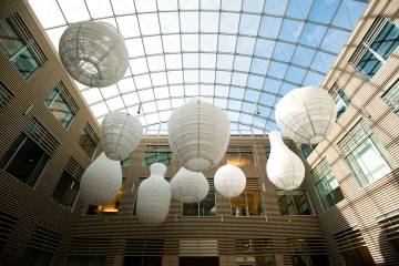 Lantern sculptures hanging from ceiling