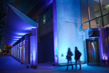 Abstract night scene with blue lighting outside the Johns Hopkins Bloomberg School of Public Health