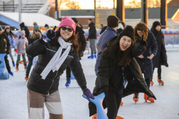 students having fun skating at the ice rink