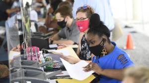 Volunteer attorneys work with community members at a previous Expungement Clinic